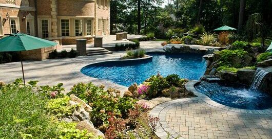 Free-Form Pool with Raised Spa and Waterfalls
