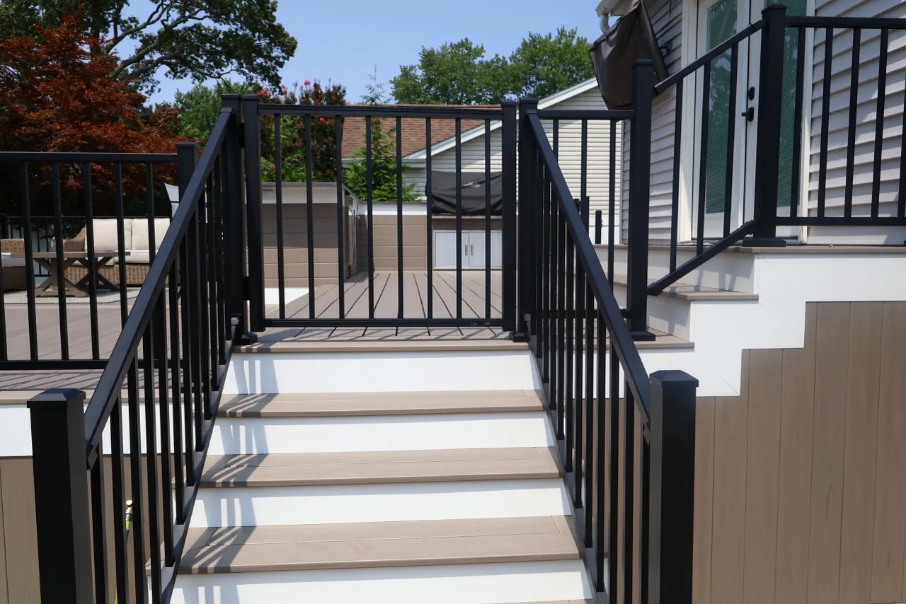 Raised deck with skirted base, dining set and lounge seating