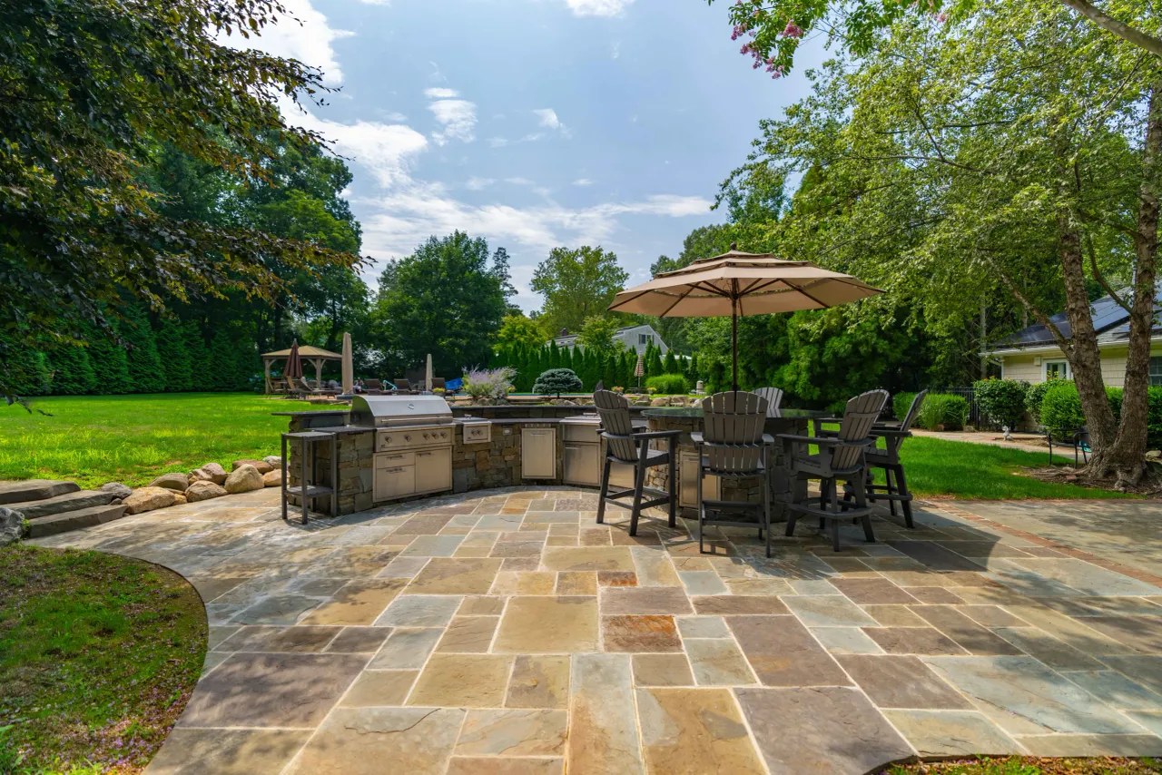 Outdoor kitchen overlooking a pool