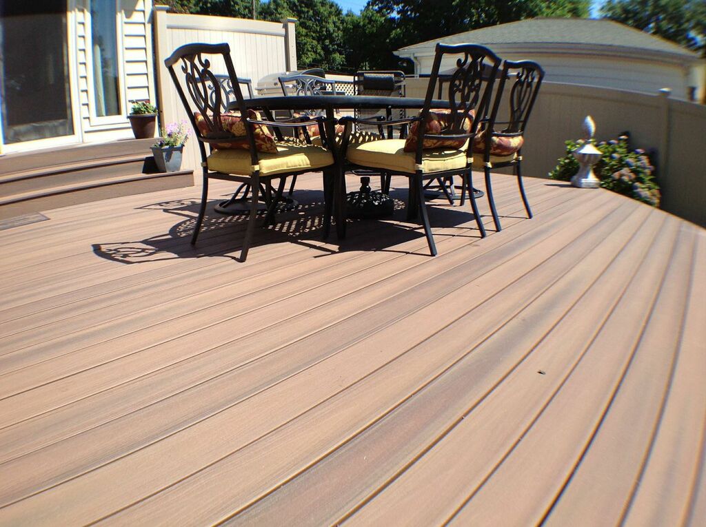 Fiberon Protect Advantage Composite Decking:Cost-friendly, modestly-sized, deck can be beautiful and functional. There is room enough to barbecue, dine, and sun bathe and is conveniently located to kitchen and back door.