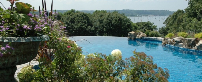 Pool Landscaping (Cove Bay/NY): Landscaping can play a key role in enhancing the experience of an infinity pool.
