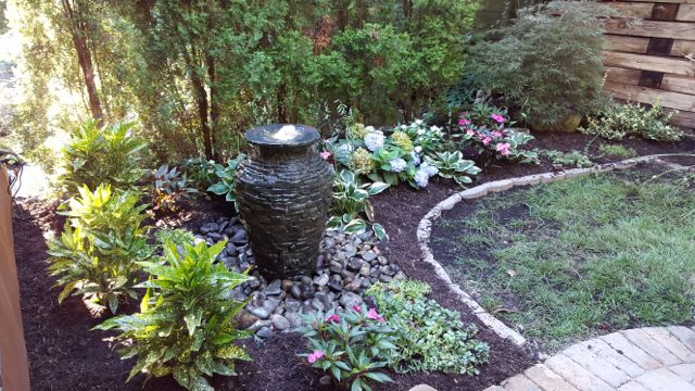Fountainscapes: Of course, winter isn’t the only time of year you’ll appreciate a water feature; even a simple fountain will provide the delightful sound of moving water and a picturesque setting.